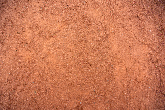 Red Sand Texture With Shoe Prints On Top