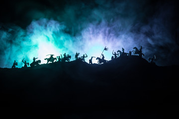 Medieval battle scene with cavalry and infantry. Silhouettes of figures as separate objects, fight...