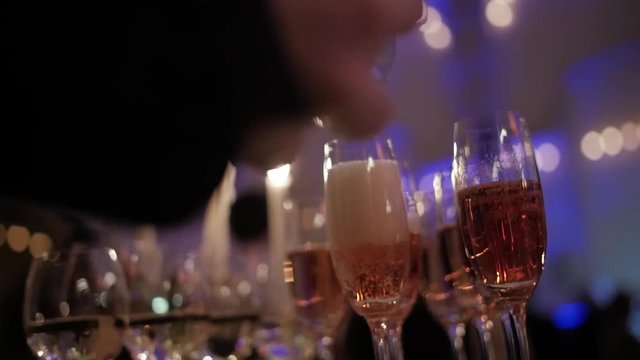 Close-up of champagne poured into a glass of bubbles