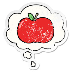 cartoon apple and thought bubble as a distressed worn sticker