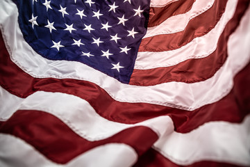 American flag with embroided stars on the blue,red and white stripes