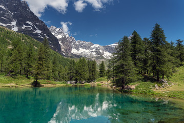 Blue lakake in Alps near Breuil Cervinia, Italy.