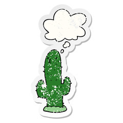 cartoon cactus and thought bubble as a distressed worn sticker