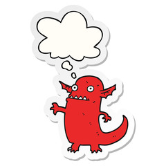 cartoon halloween monster and thought bubble as a printed sticker