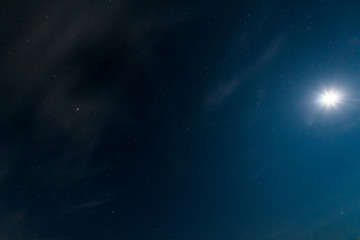 night sky.  moon and stars. long exposure