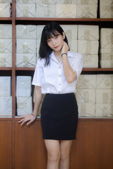 Portrait of thai adult student university uniform beautiful girl relax and smile
