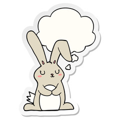 cartoon rabbit and thought bubble as a printed sticker