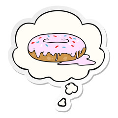 cartoon donut and thought bubble as a printed sticker