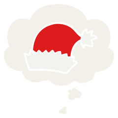 cartoon christmas hat and thought bubble in retro style