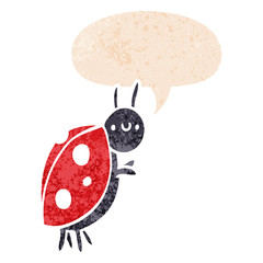 cartoon ladybug and speech bubble in retro textured style