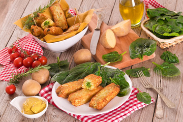 Potato croquettes with spinach and mozzarella. 