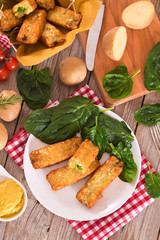 Potato croquettes with spinach and mozzarella. 