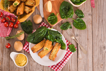 Potato croquettes with spinach and mozzarella. 