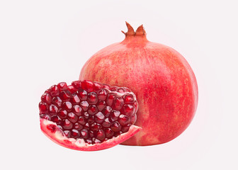Purified pomegranate fruit. Juicy ripe pomegranate on a white background.