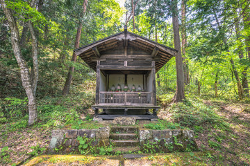 Fototapeta na wymiar Takayama - May 26, 2019: Traditional buildings in the Hida folk village open air museum of Takayama, Japan