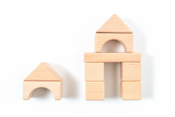 Model of the wooden house on white background