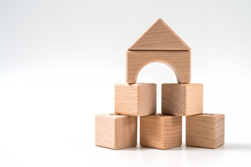 Model of the wooden house on white background