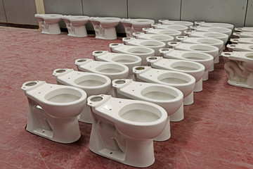 Ceramic toilet parts in a factory