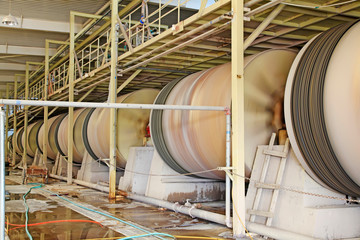 Raw material tank in a production workshop