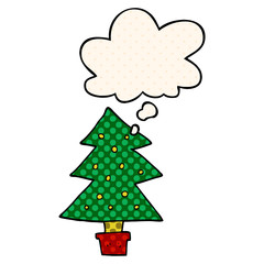 cartoon christmas tree and thought bubble in comic book style