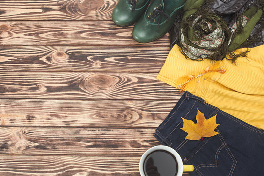 Top View Shot Of Autumn Background. Fall Woman`s Clothes Flat Lay Picture. Woman Wardrobe.