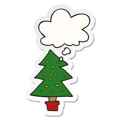 cartoon christmas tree and thought bubble as a printed sticker