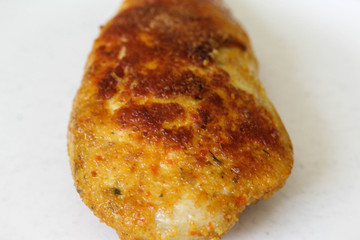 baked cordon bleu or schnitzel cordon bleu on plate