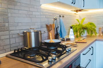 pan on stove with pancakes