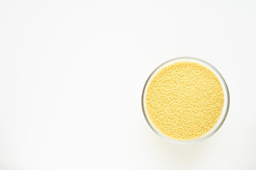 couscous in bowl on white background