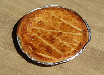 Selfmade Dutch Butter Cake (Boterkoek) cookie, fresh baked from the oven. Displayed on wooden background