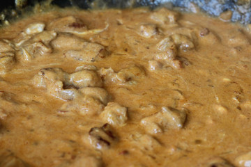 self baked Indian chicken tandoori sauce in pan in kitchen