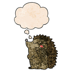cute cartoon hedgehog and thought bubble in grunge texture pattern style