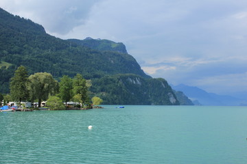 Beautiful camping place at the shore of Lake Brienz, Switzerland.