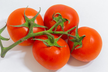 fresh tomatoes on white background