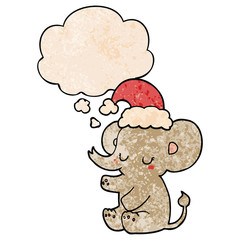 cute christmas elephant and thought bubble in grunge texture pattern style