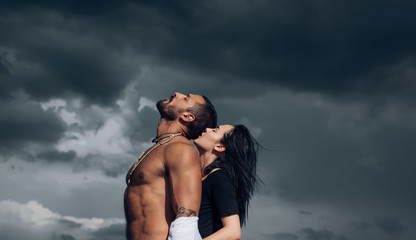 Passion love couple. Romantic moment. Handsome muscular guy and amazing sexy woman. Cosmopolitan...