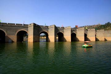 Fototapeta premium China ancient Great Wall building landscape in the water