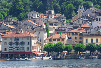 Fototapeta na wymiar one of the most beautiful towns in Italy seen from the island of San Giulio. Orta - Italy