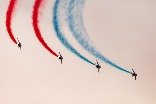 The Armée de l’Air display Team Patrouille de France performing one of their displays. Seen here banking to the right on a evening display.