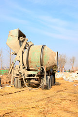 Fototapeta na wymiar concrete mixer at the construction site