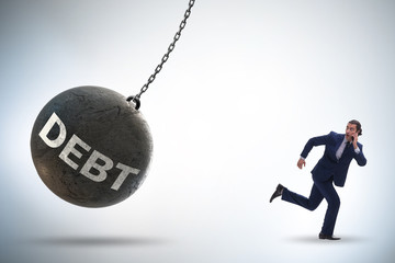 Businessman in debt and loan concept