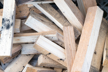Close-up of piles of leftover timber thrown together