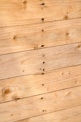 sloping nailed wooden boards wall as texture or background