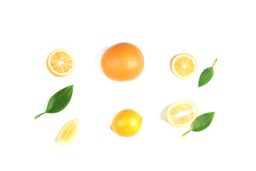 Oranges of different sizes on a white background with leaves