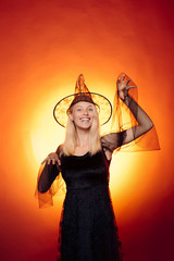 Close-up portrait of gorgeous happy blonde fairy enchantress, hot figure, body. Portrait of a...