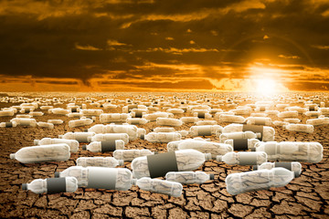 Obraz premium Plastic bottles in the desert. Post-apocalyptic landscape. Planet after the effects of plastic waste. 