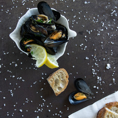 Cooked delicious black mussel with toasted bread. Healthy eating concept, rich protein  food