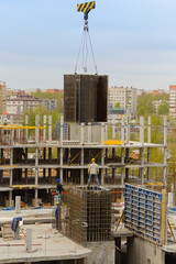 May 15, 2017: Builders work on monolithic works at the construction site of a multi-storey...
