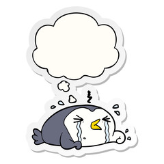 cartoon crying penguin and thought bubble as a printed sticker