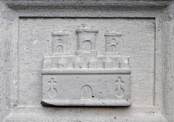 Sandstone relief decoration on an old building, a castle.